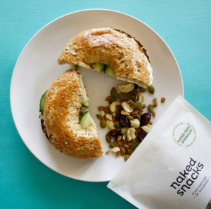 bagel with avocado and naked snacks