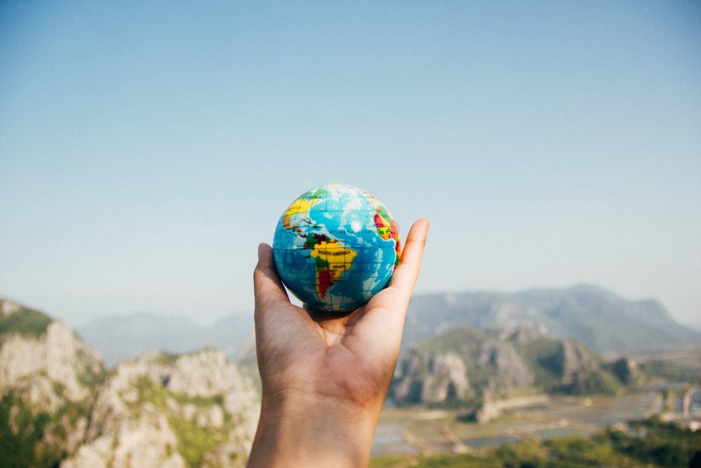 A Hand Holding Globe